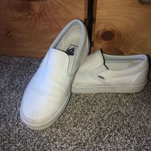 Vans white slip ons